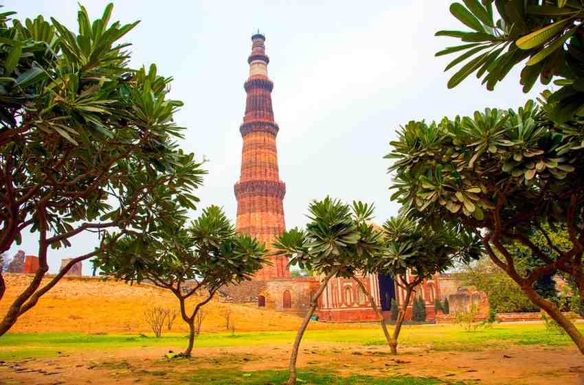 The towering Qutub Minar, an iconic landmark among places to visit in Delhi.