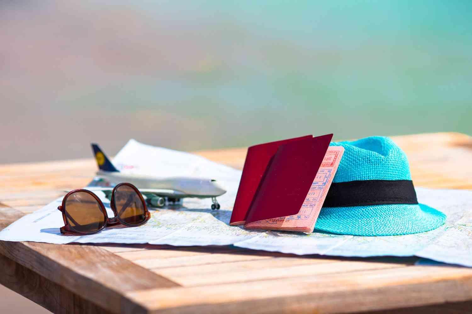 A travel planner consulting with a client over a map.